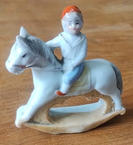 Antique boy rocking horse - boy,